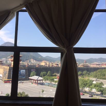 横店梦意创意酒店预订价格,联系电话\位置地址